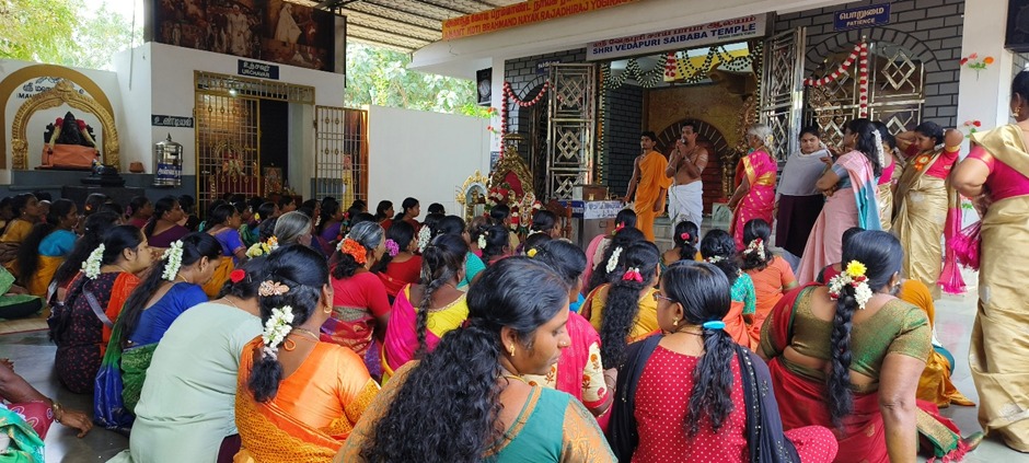Devotees witnessing the rituals