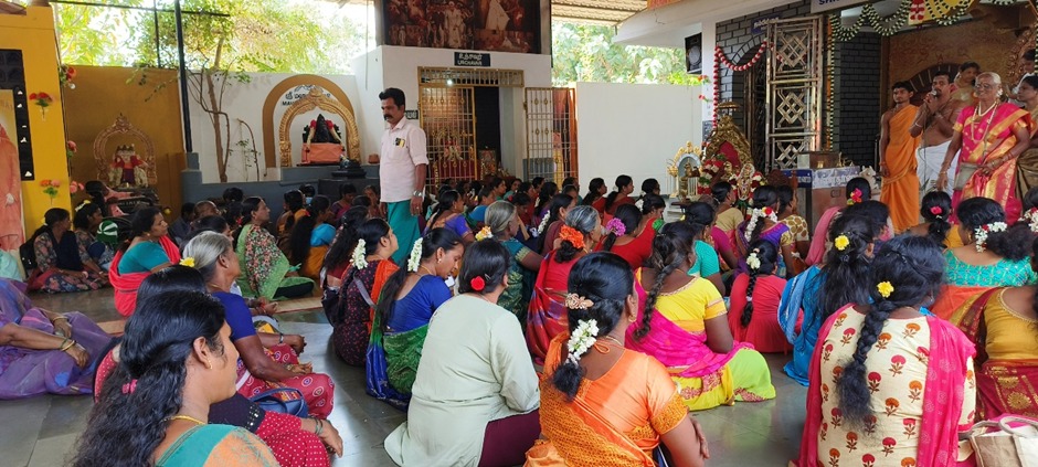 Devotees witnessing the rituals